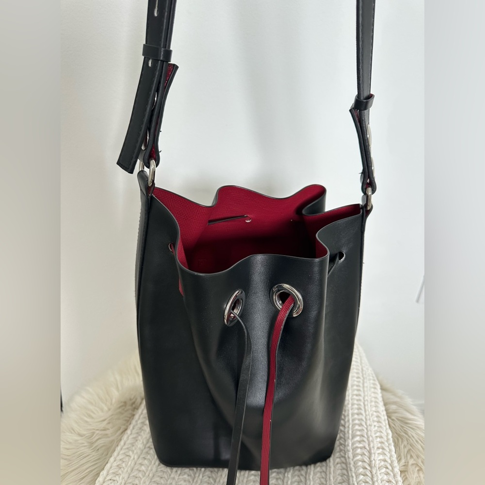 Zara black bucket bag with red details and silver accents